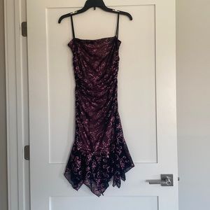 Taboo size, medium, black, and pink and pink glitter dress lined.